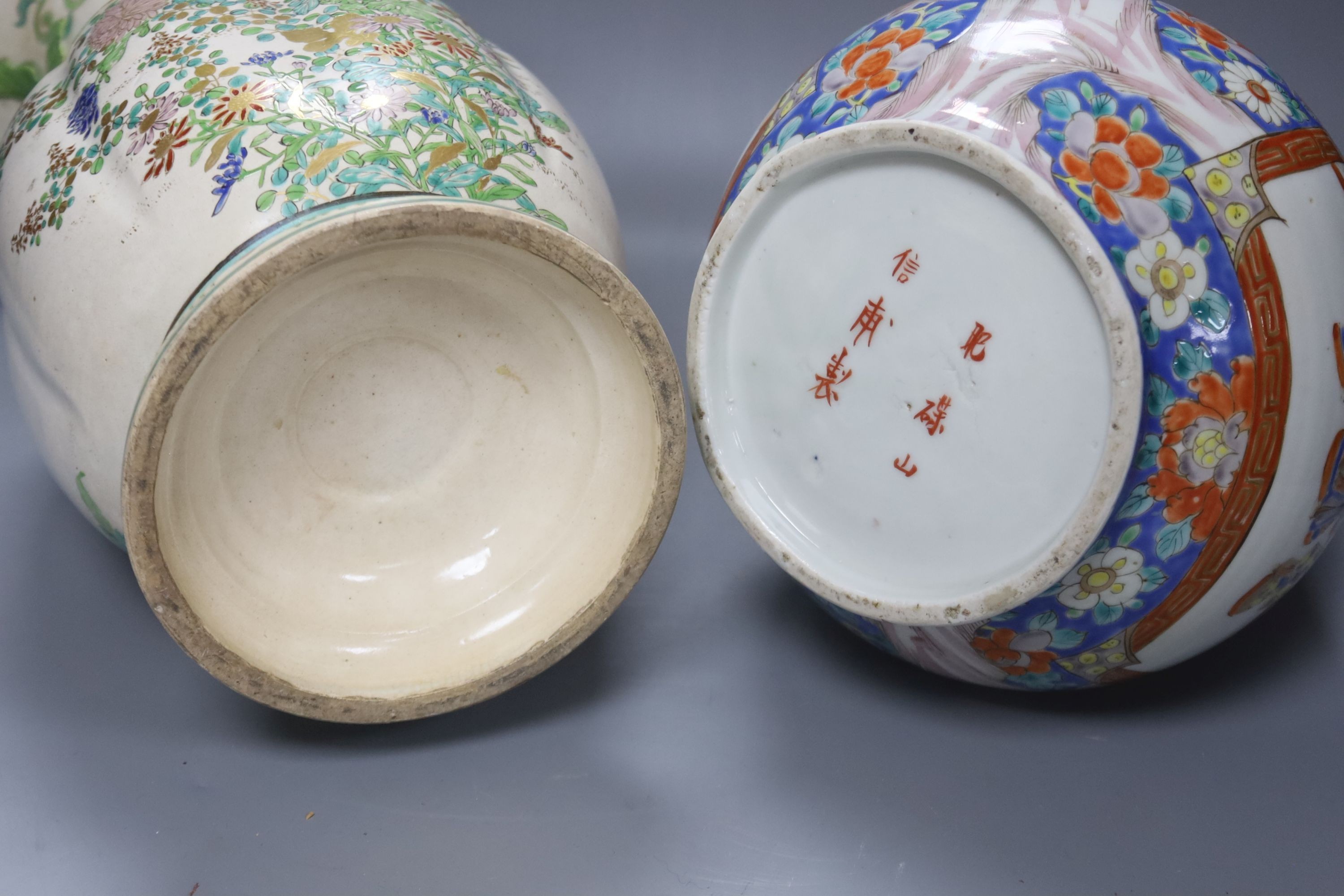 A Japanese porcelain bottle vase and a large Satsuma pottery vase (restoration) 39cm (2)